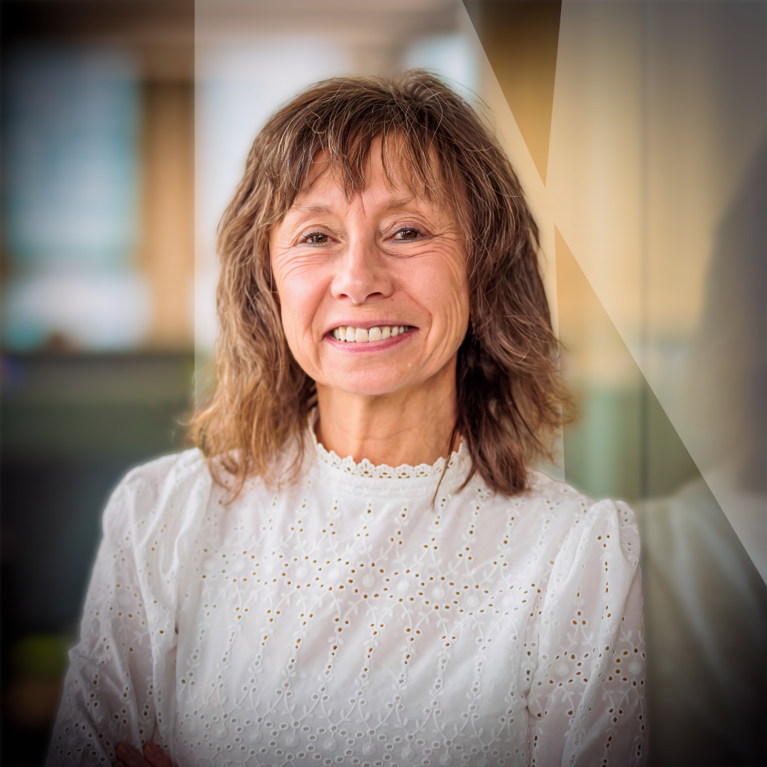 Portrait d'entreprise de Micheline Streel souriante