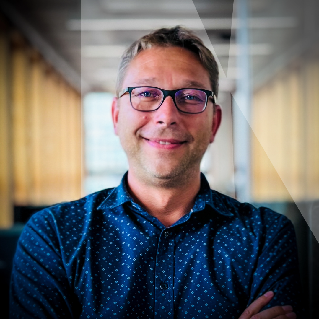 Portrait d'entreprise de Thibaut Damanet souriant