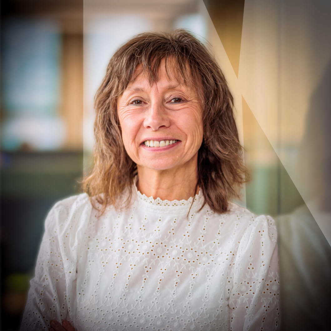 Portrait d'entreprise de Micheline Streel souriante